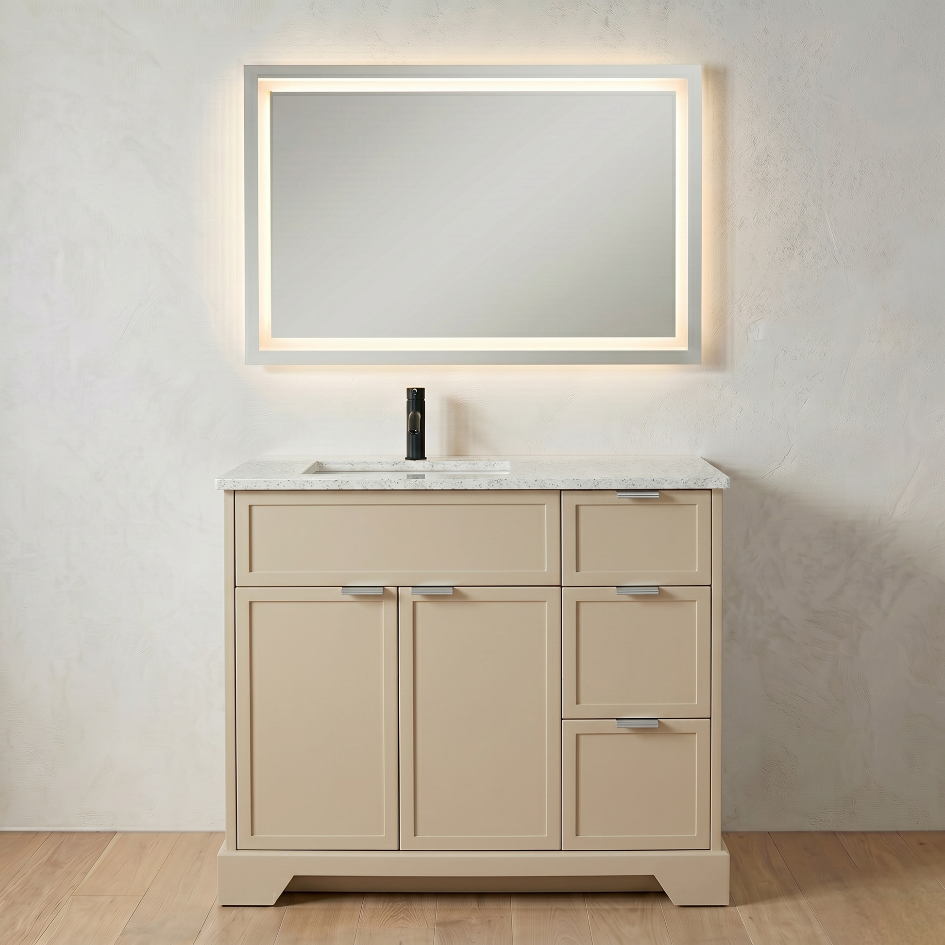 Beige bathroom vanity with mirror and sink on a light wood floor.