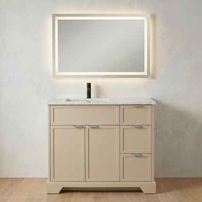 Beige bathroom vanity with mirror and sink on a light wood floor.