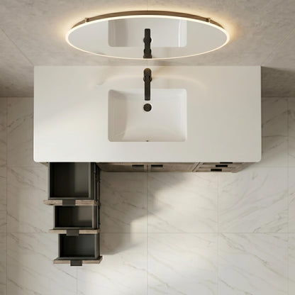 Bathroom vanity with sink and light fixture in a modern bathroom setting