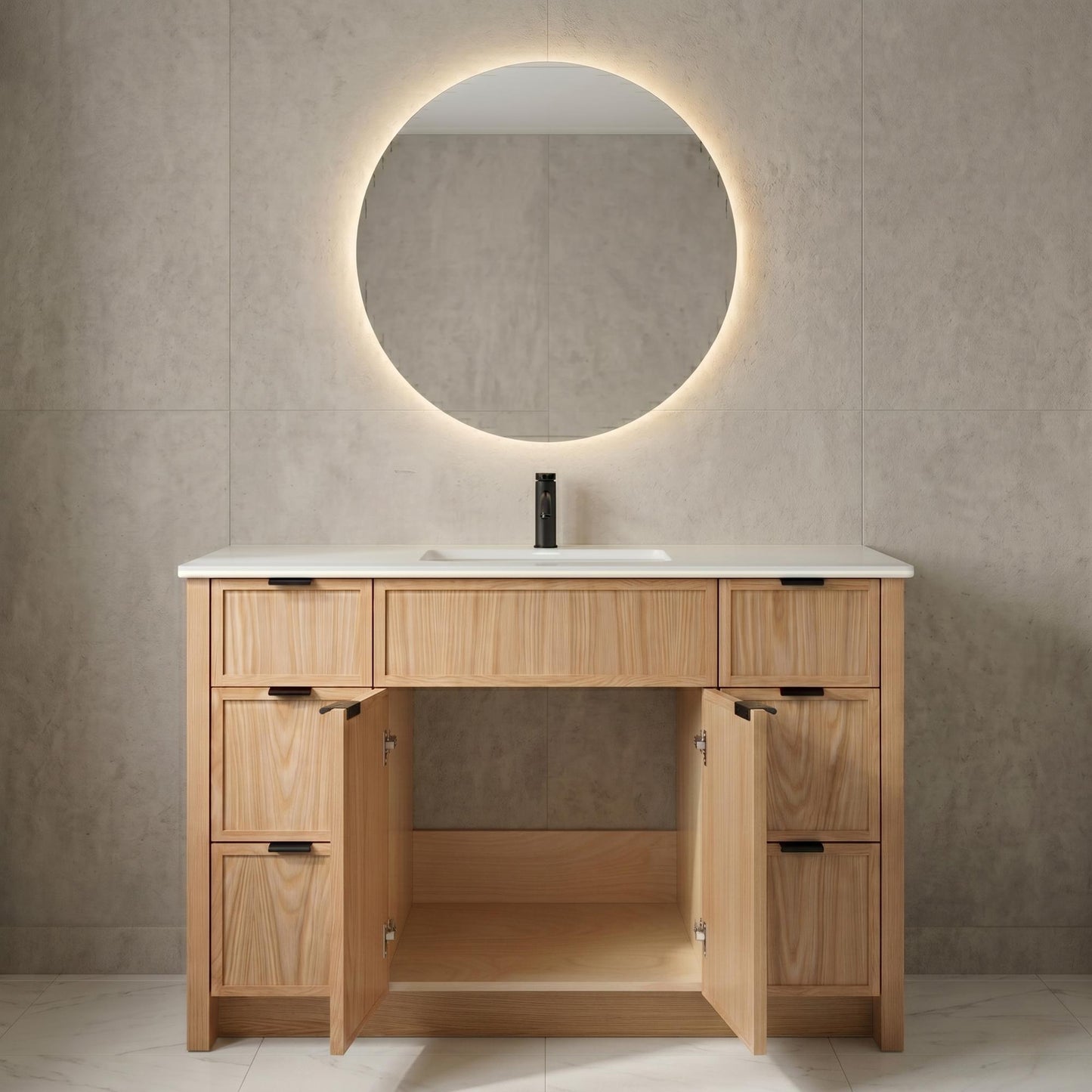 Bathroom vanity with round mirror and light fixture on a tiled wall.